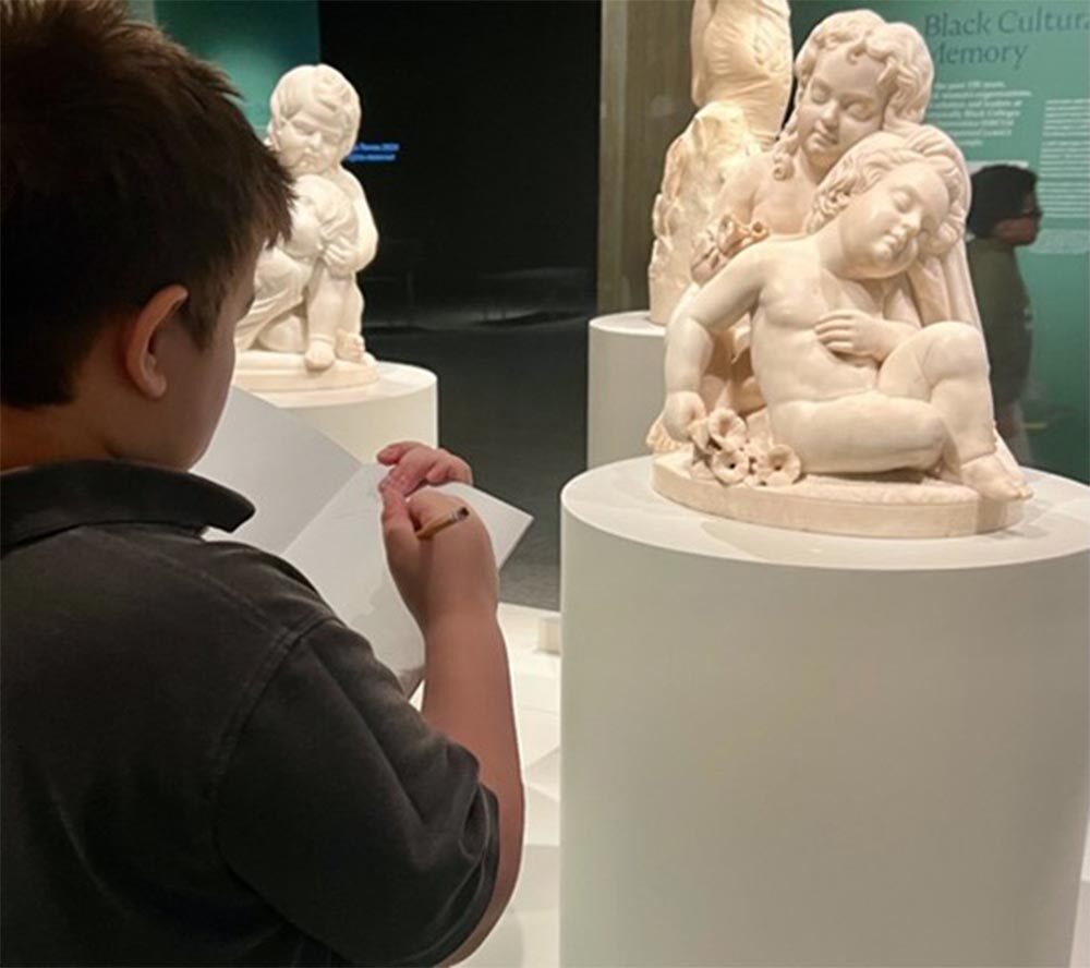 A student explores Edmonia Lewis: Said in Stone as part of PEM’s Learning and Community Engagement effort to get as many local school children as possible into the exhibition.