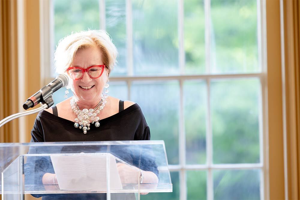 Lynda Hartigan giving remarks at the Studio Glass opening reception in 2024. Photo by David N. Tucker/PEM.