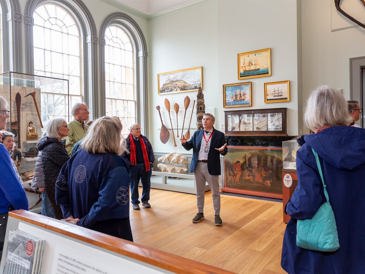 George hosting a tour in the East India Marine Hall