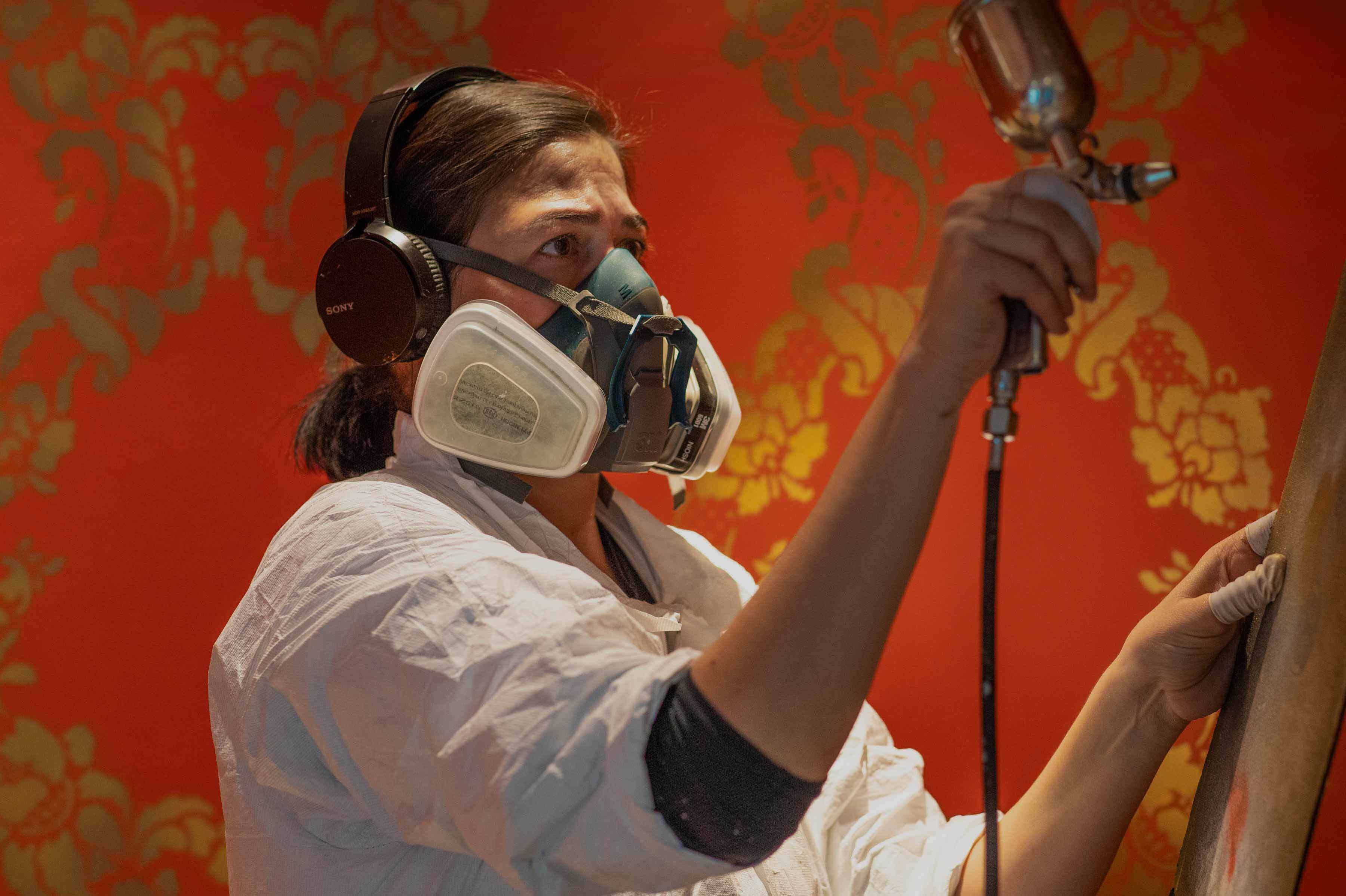 Stencils, spray paint, wall-to-wall