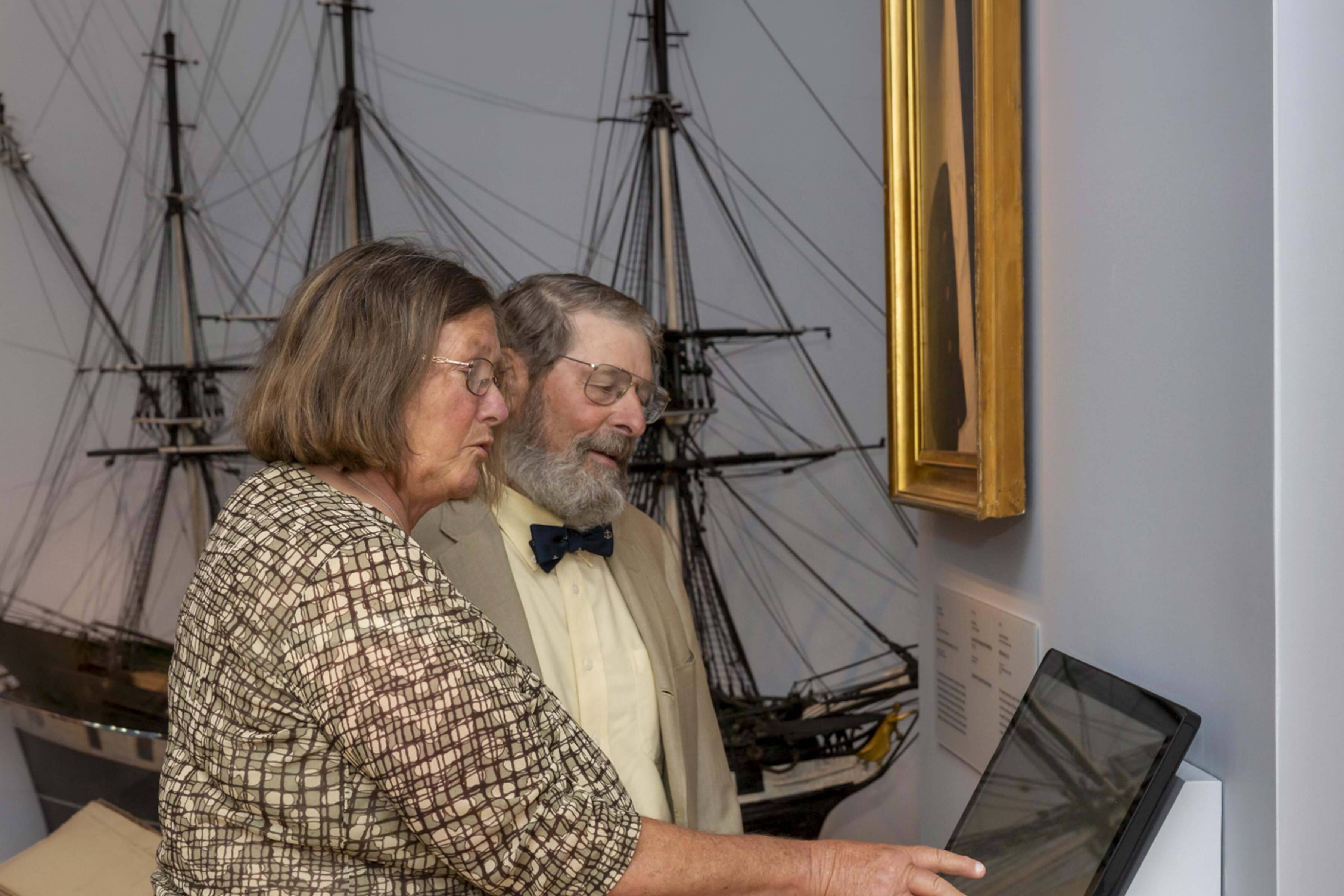 Joanie and Tim Ingraham in 2019 in PEM’s Maritime Art gallery. Photo by Kathy Tarantola/PEM.