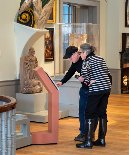 Couple viewing collection pieces in the East India Marine Hall