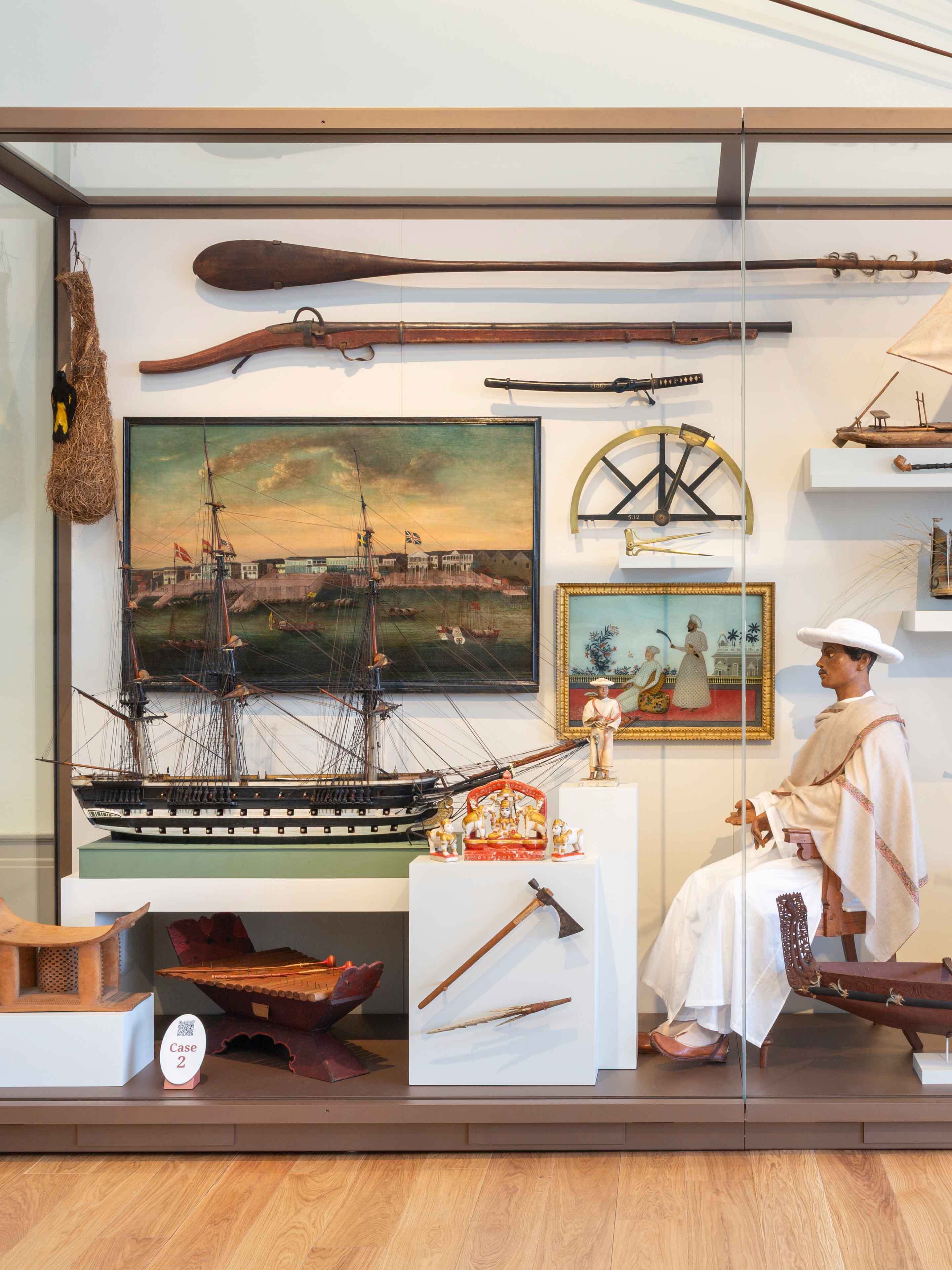 A cabinet in the new installation of East India Marine Hall at PEM. Photo by Kathy Tarantola/PEM.