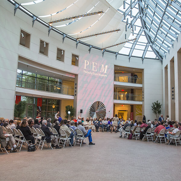 Visitors listening to a concert in the Museum Main Atrium