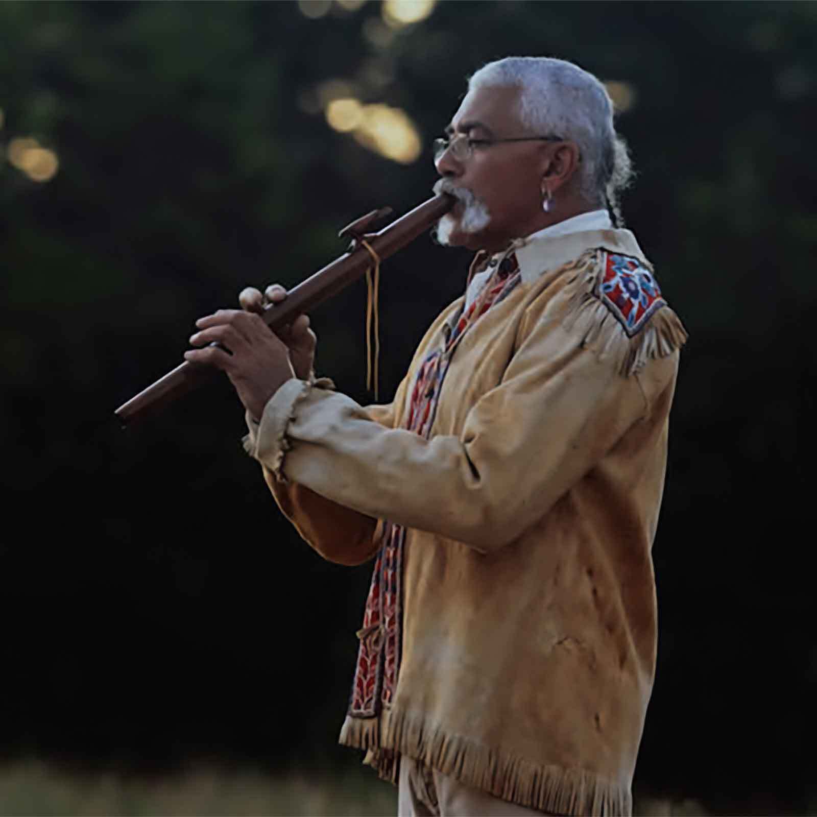 Hawk Henries playing the flute