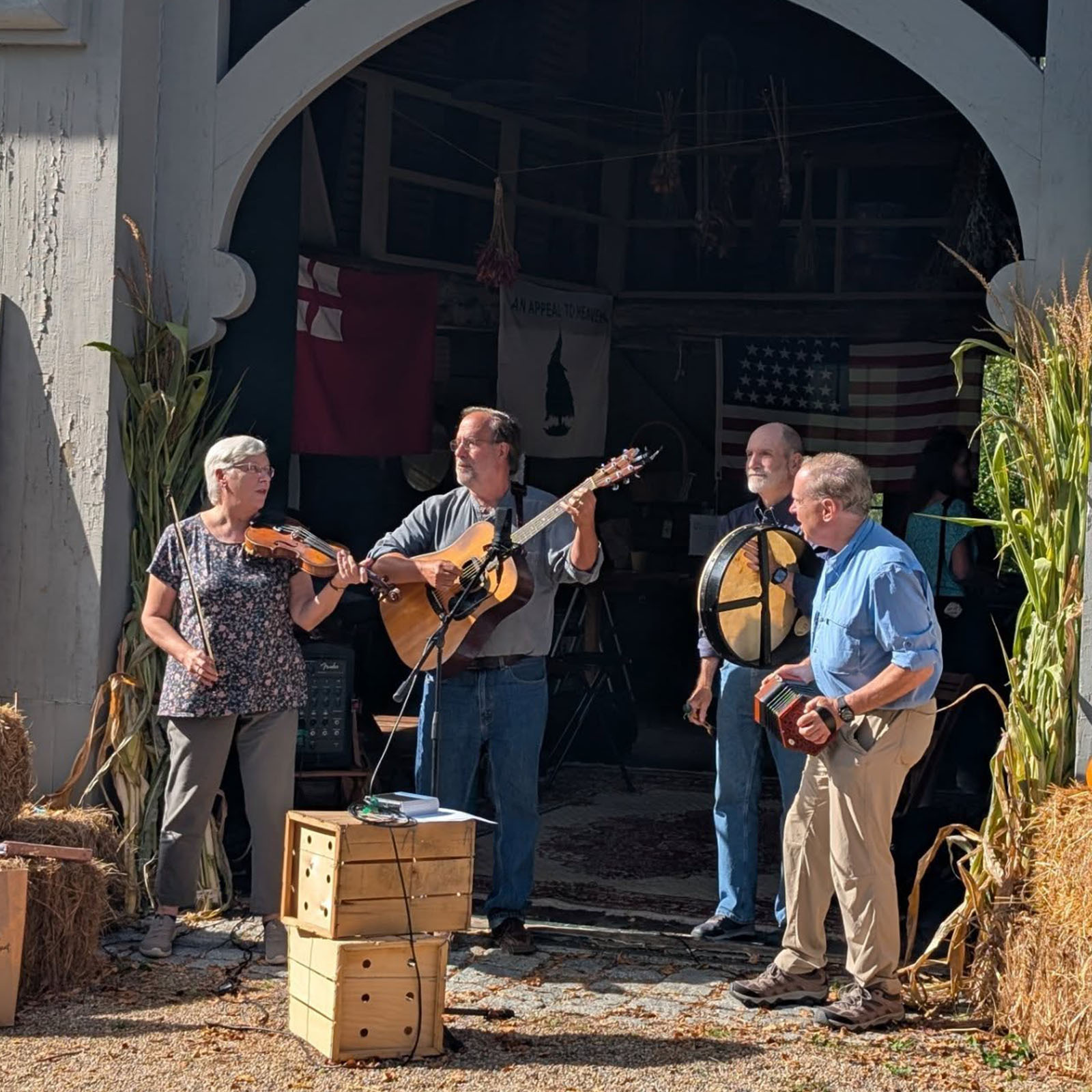 The Fo'c'sle Four playing instruments