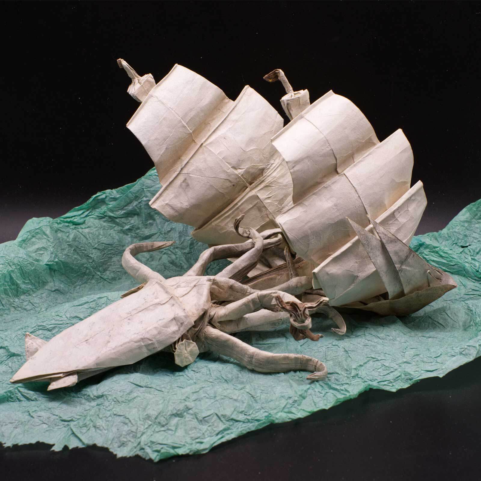 Origami ship being attacked by a kraken