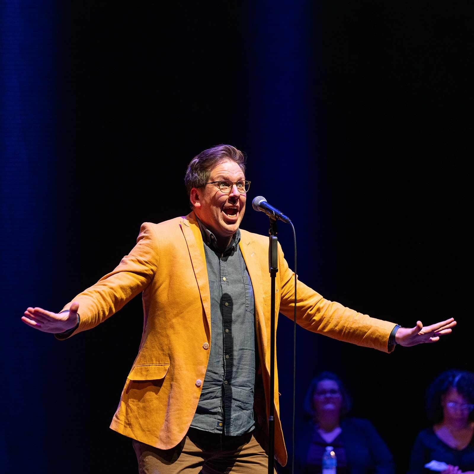 Moth performer on stage