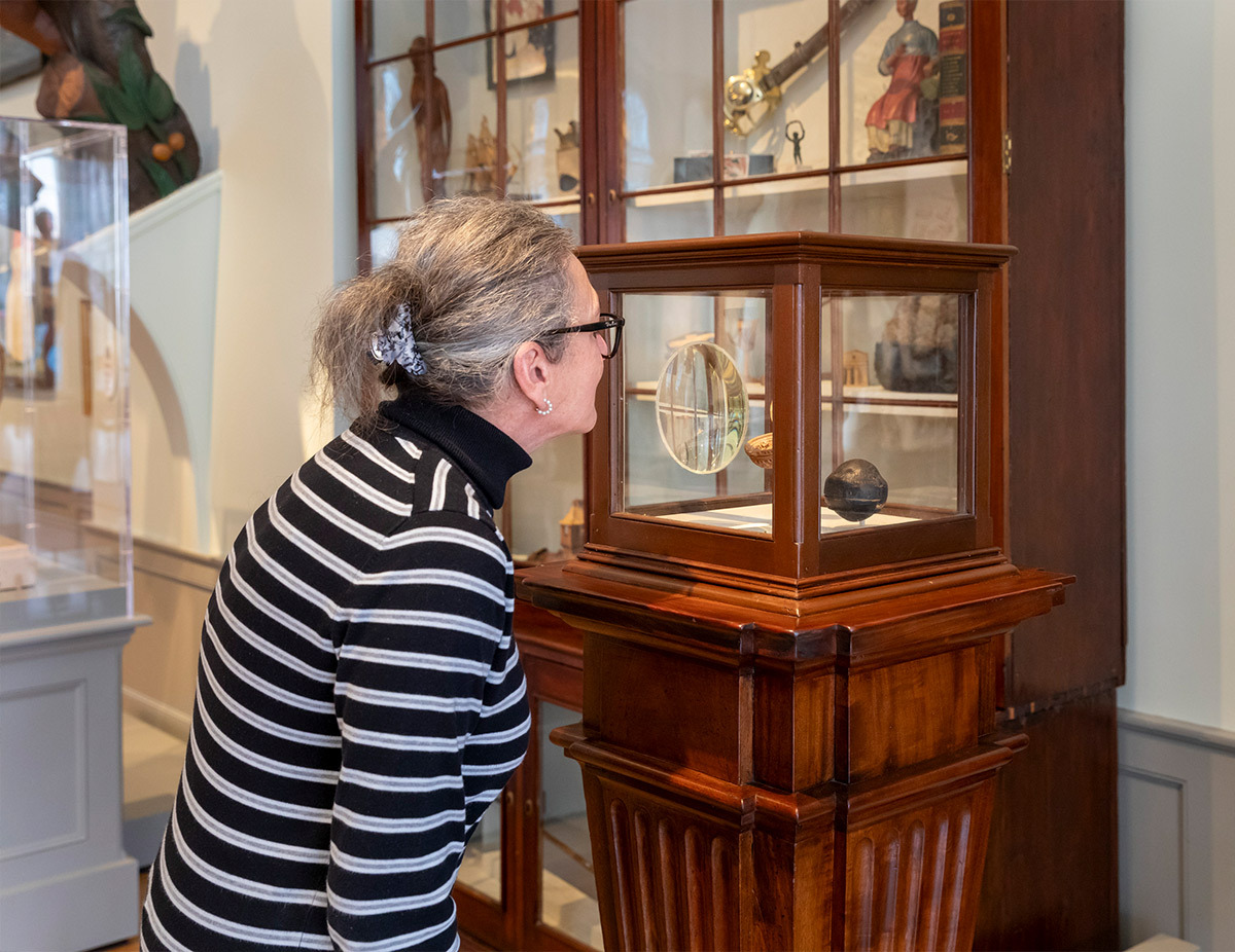 A guest in the newly installed East India Marine Hall.