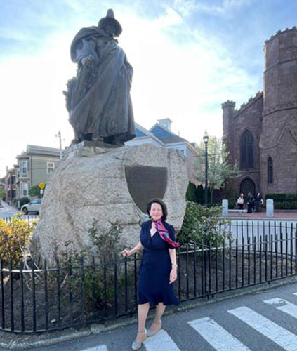 Karen Scalia with Roger Conant statue in Salem MA