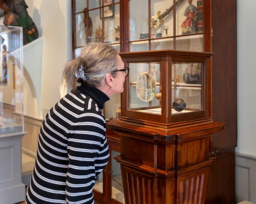 A guest in the newly installed East India Marine Hall.