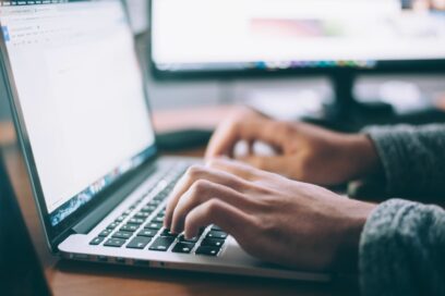 Photo of someone typing an email