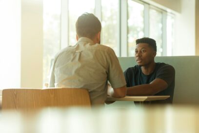 Photo of two men having an interview