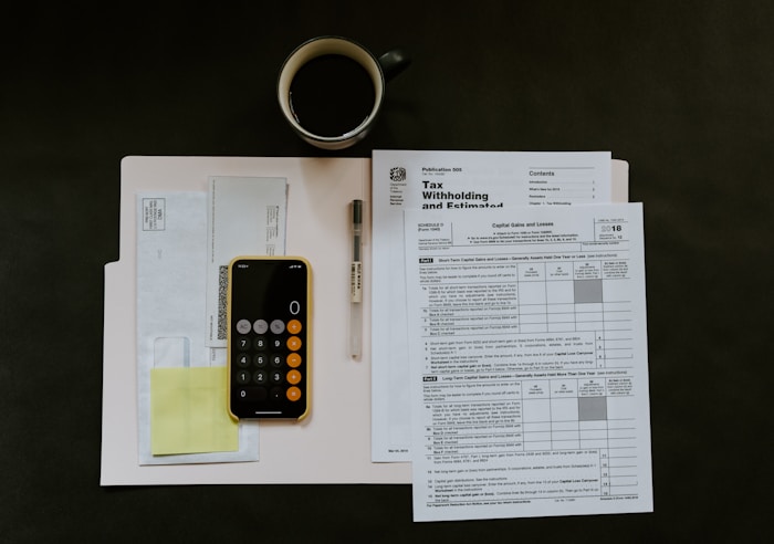 Tax forms and a calculator