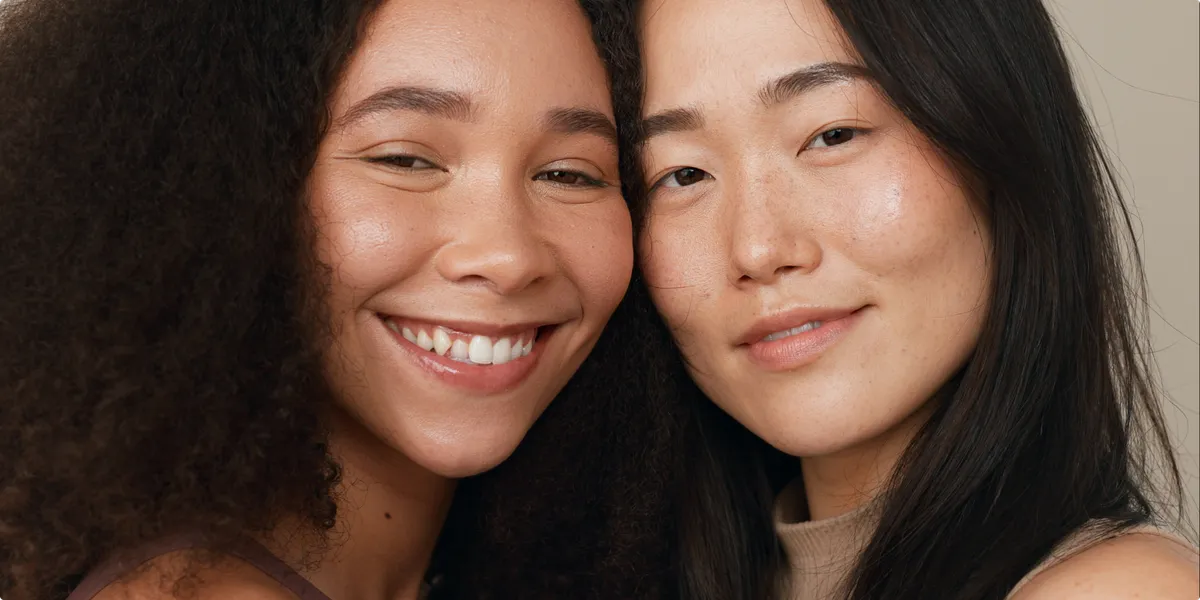 Face of happy people on neutral background