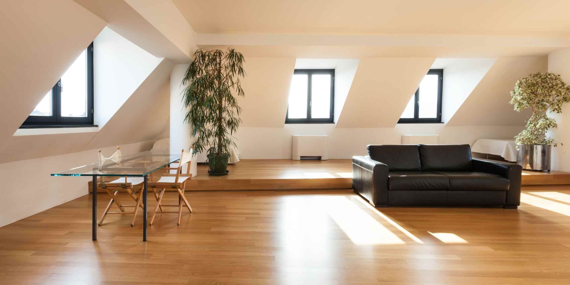 Natural Light in
Photography – Illuminating Interior Spaces A modern interior flooded with natural light, casting soft shadows
and highlights across wooden floors and furniture.