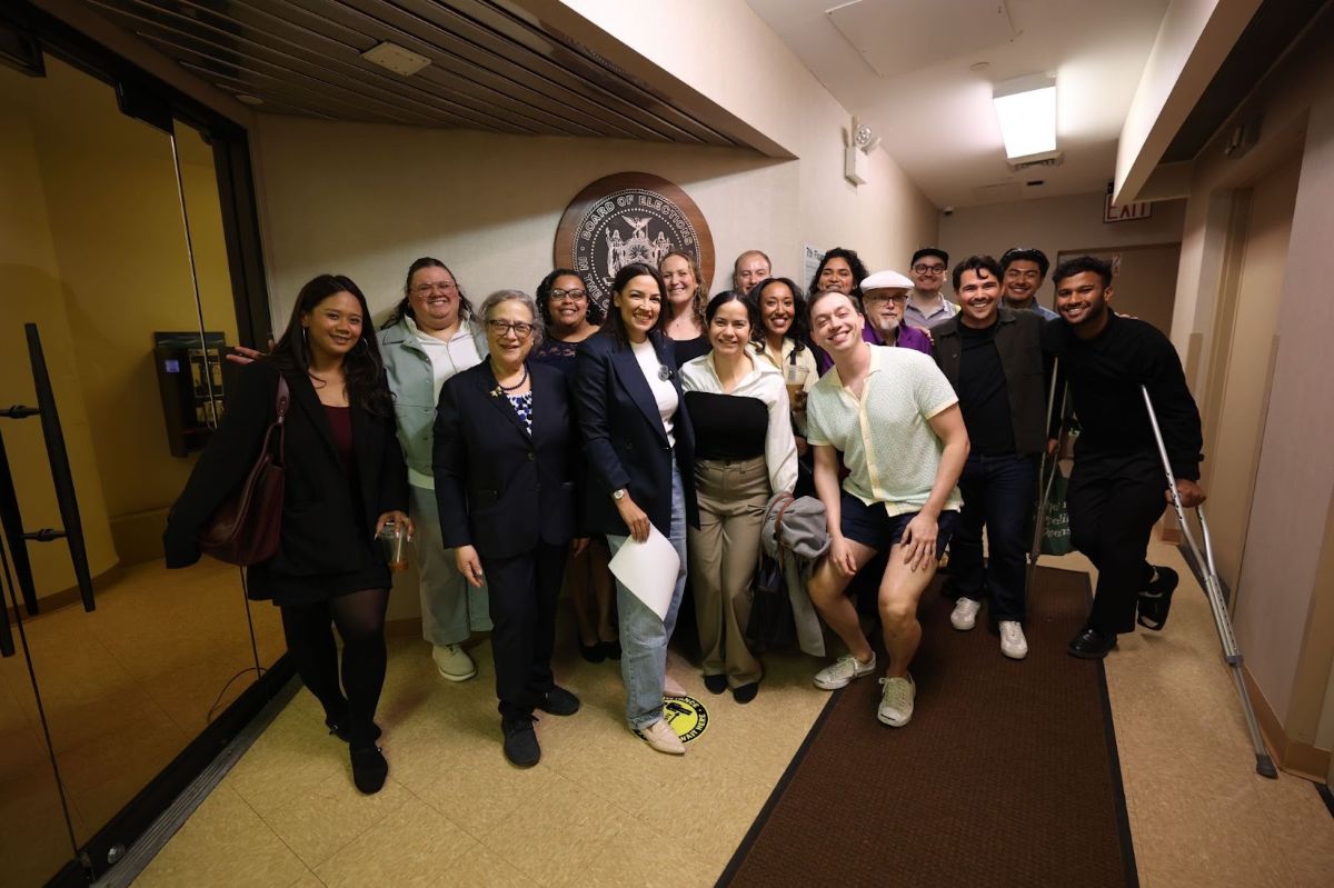 Alexandria and Team AOC submitting petition signatures.