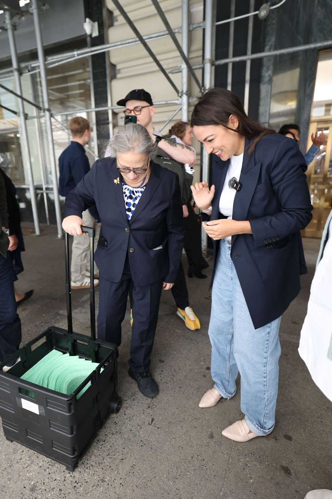 Alexandria submitting petition signatures.