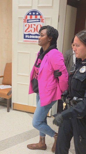 Angie Nixon being arrested while protesting at Ron DeSantis' office