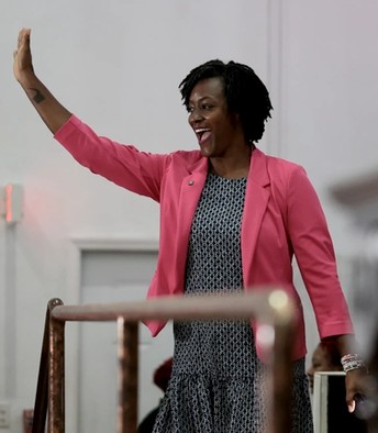 Angie Nixon waving