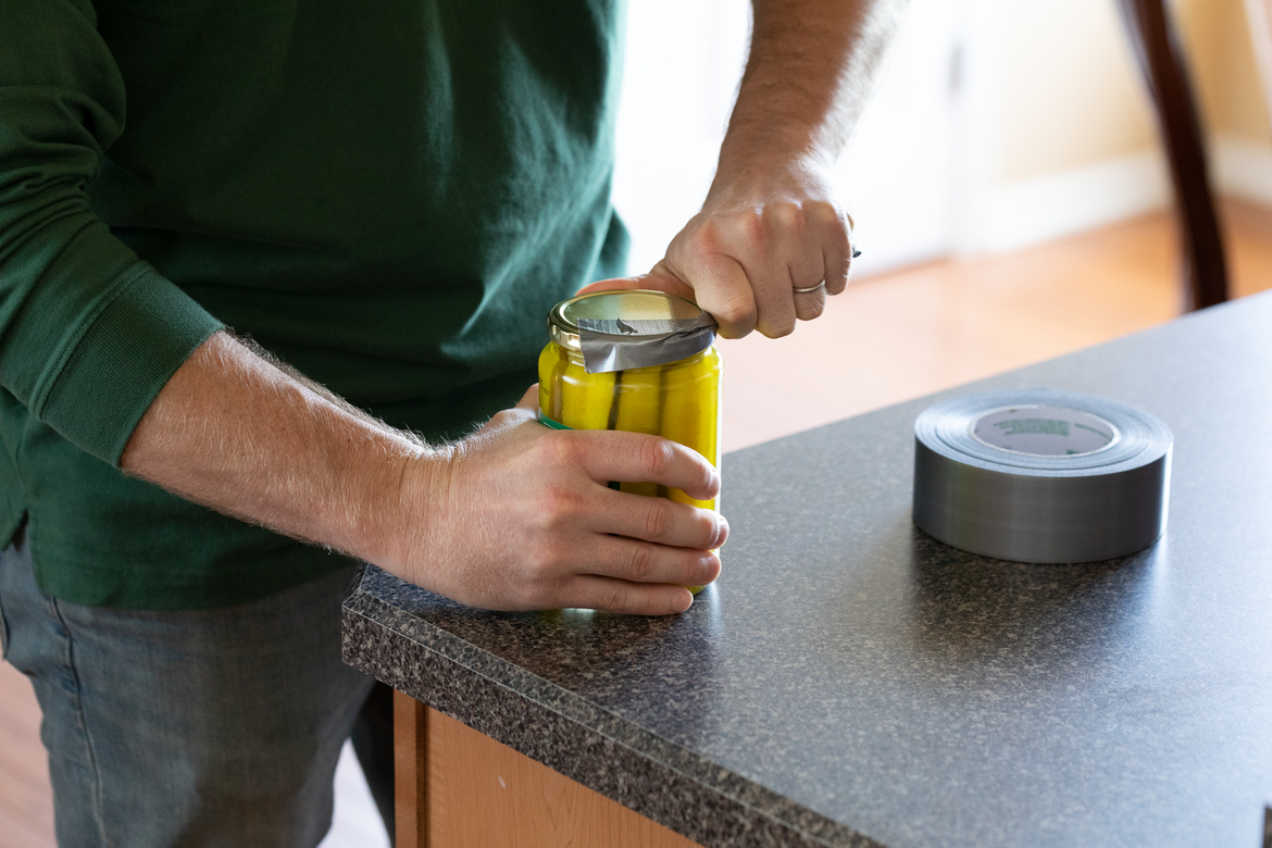 Open a pick jar lid using duct tape as a handle Open a pick jar lid using duct tape as a handle