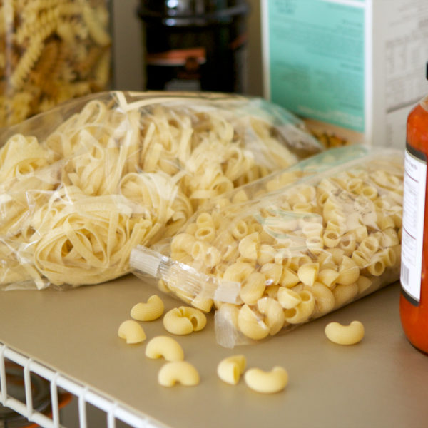 Solid Grip Clorox Easyliner in a pantry with pasta spilling out on top of it