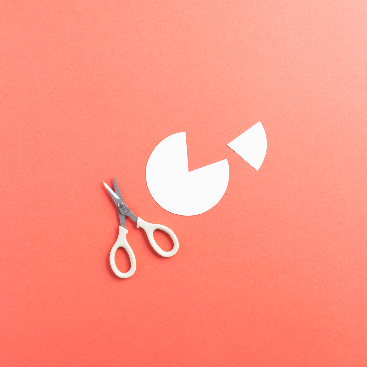 A roll of Duck Tape traced onto cardstock and cut out. Then a small wedge cut out of the circle