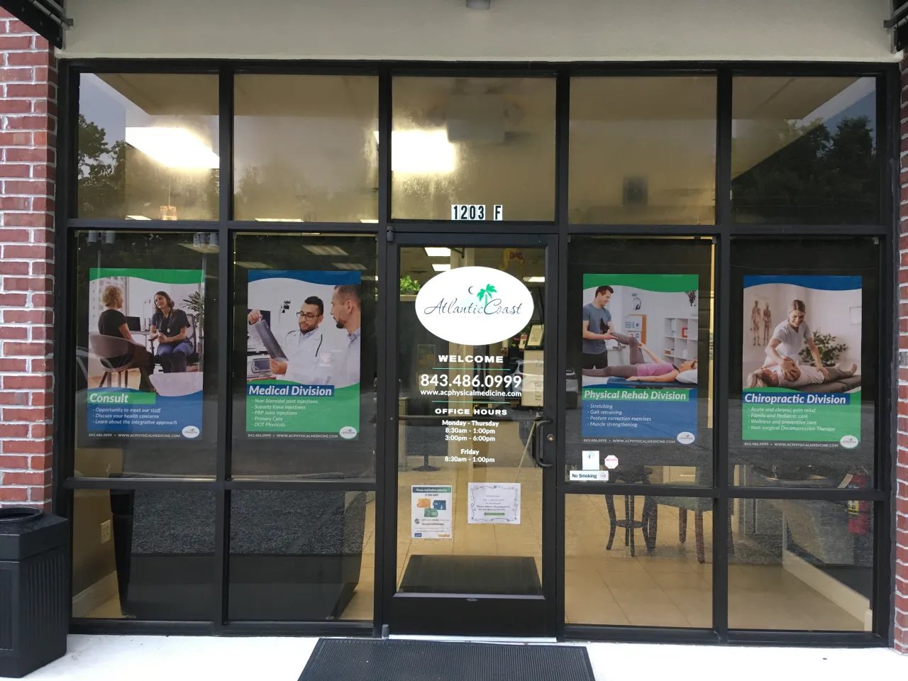 Atlantic Coast Medical storefront with door and window graphics applied to the glass.