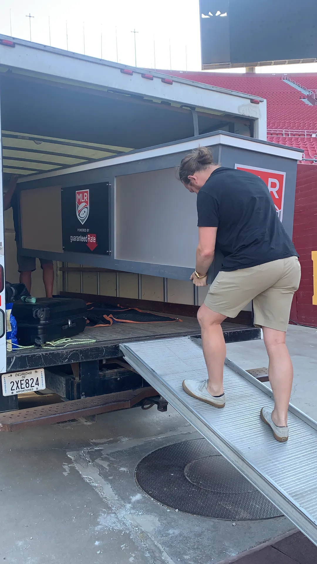 Delivery and final desk build with front sign loaded for transport, ready to be deployed to the stadium site.