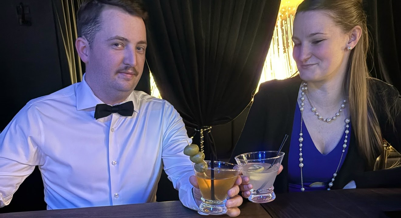 Guests toasting craft martini cocktails