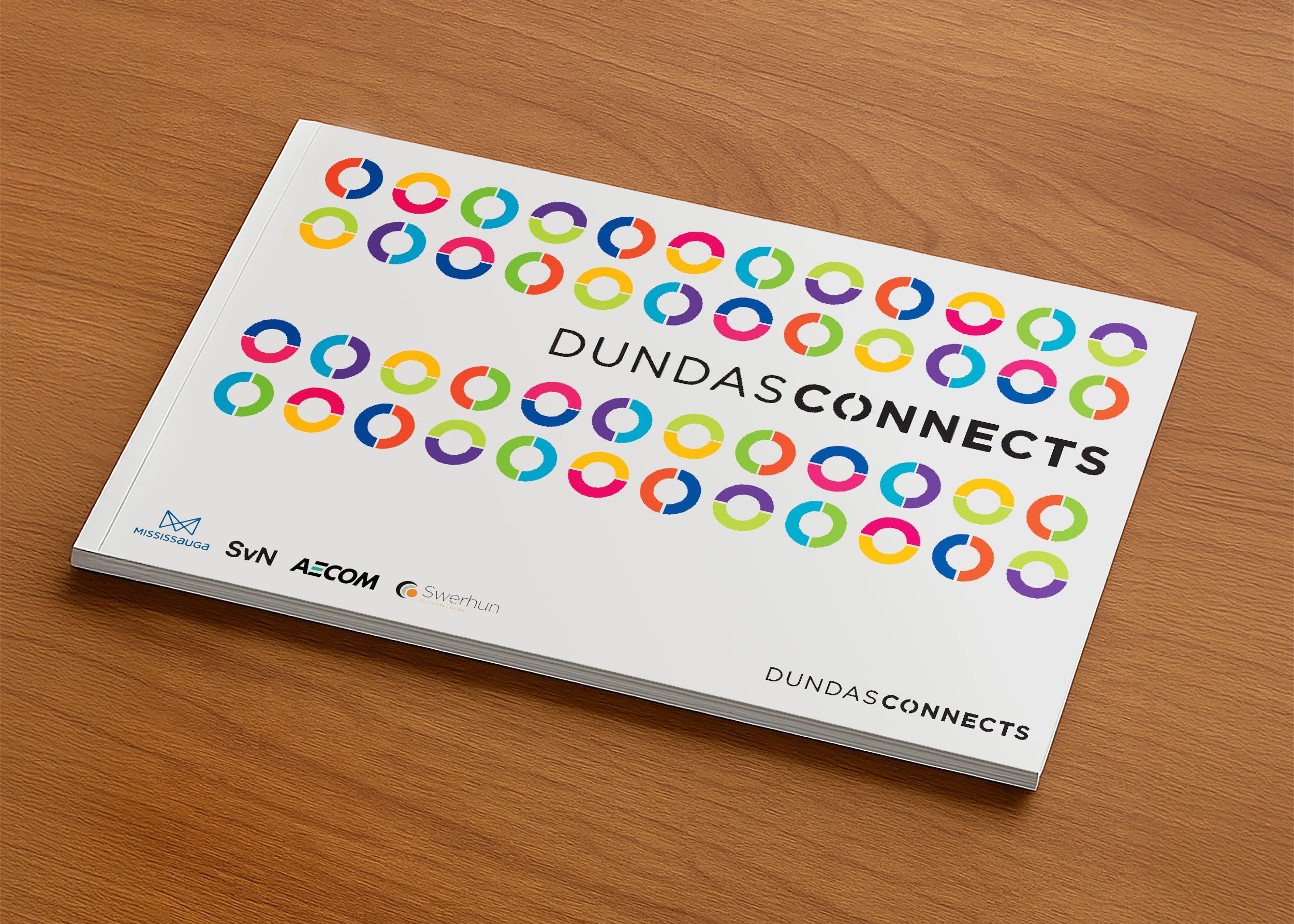Title page of Dundas Connects report featuring colorful circular icons and partner organization logos.