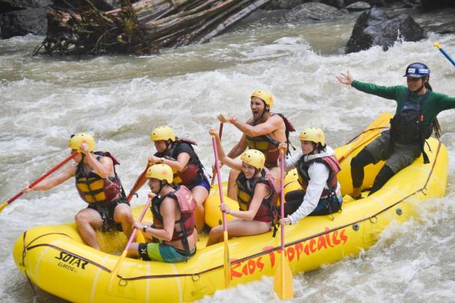 A group of teens rafts down a river on their summer adventure tour of Costa Rica.