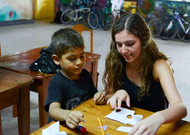 A student participates in community service projects at a school in Costa Rica on her teen tour.