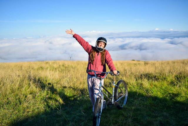 Teens go mountain biking in Hawaii on summer service program.