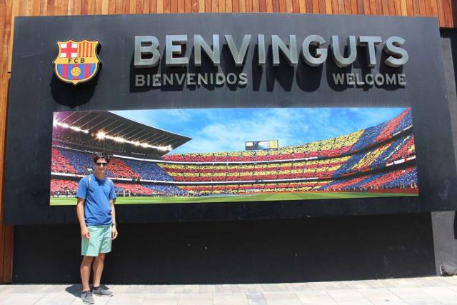 Teenager visits Barcelona soccer stadium on summer Spain travel program