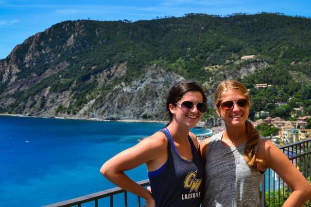 Teens pose for a photo during their Cinque Terre hike on their summer travel program in Italy.