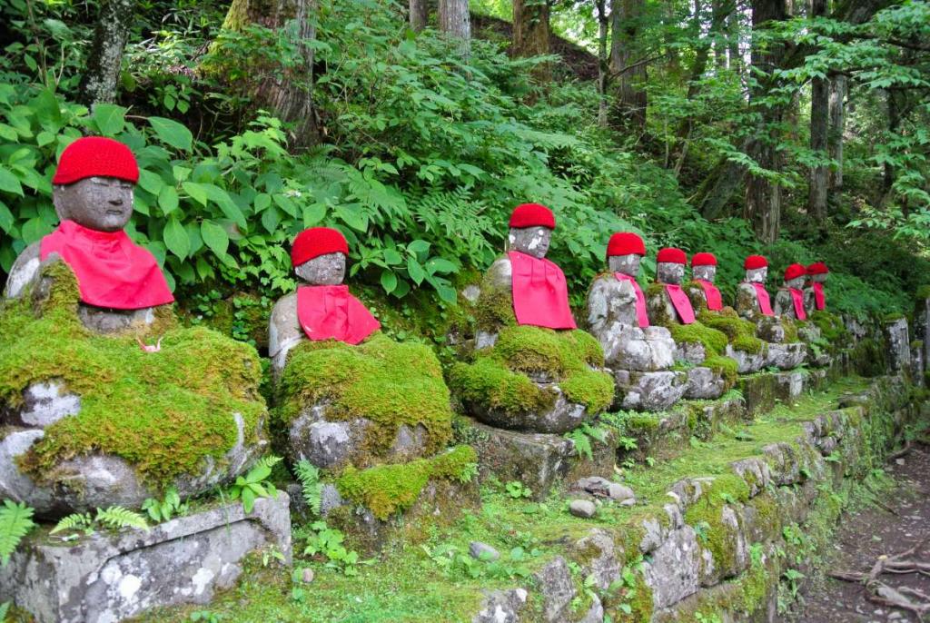 Religious statues seen by teenage travelers during summer youth travel program in Japan