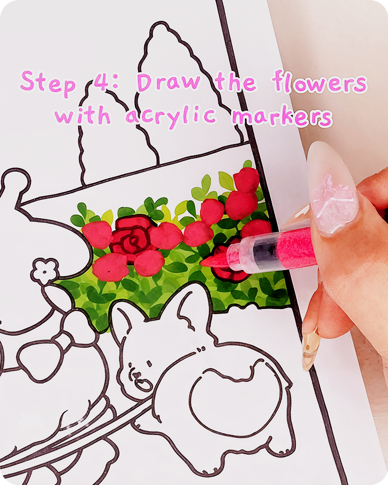 adding small roses with an acrylic marker to the rose bush
