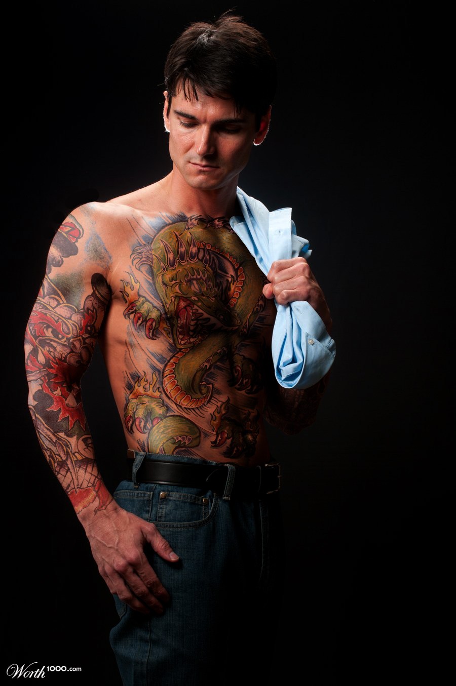 Man with the dragon tattoos.