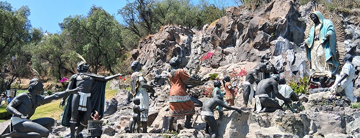 This display of offerings to Our Lady from the Aztecs and Bishop is in the gardens at the Shrine of Our Lady of Guadalupe.