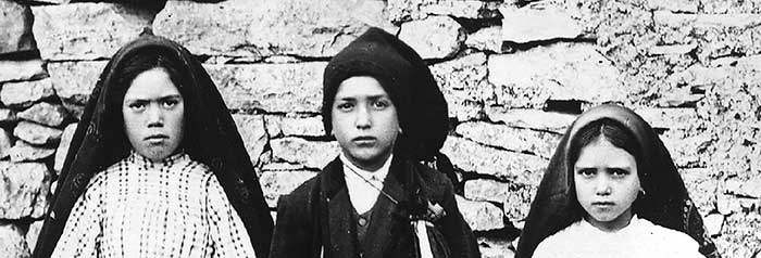 Francisco Marto, flanked by his cousin Lúcia Santos (left) and his sister Jacinta (right). In 1917, Our Lady revealed a three-part secret to the children in Fátima, Portugal.