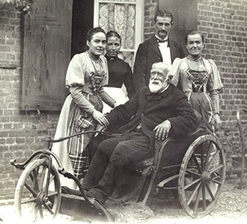Saint Louis Martin surrounded by his daughter Céline (left), the Le Juifs (center, rear) who served in the Martin household and his daughter Léonie (right). He spent his final years at 7 Rue Labbey, Lisieux.