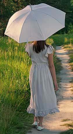 Woman walking with umbrella