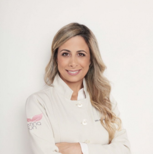 Dra. Cristina Aun, Dentista