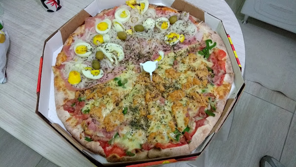 Foto 3 Rapidità Pizzaria - Unidade Alto da XV. Forno a lenha, massa artesanal, recheada, entrega com rapidez.