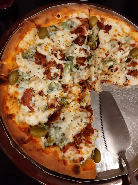 Foto 1 Venutti Pizzaria