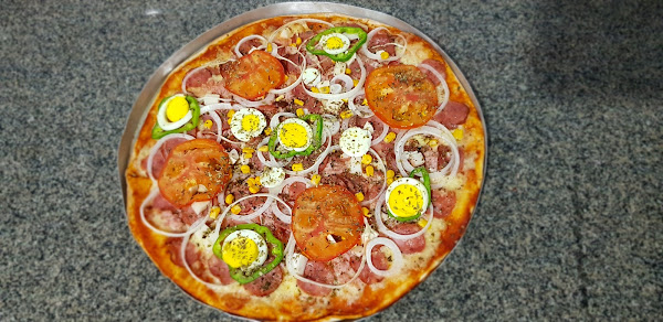 Foto 1 Tortelline pizza delivery