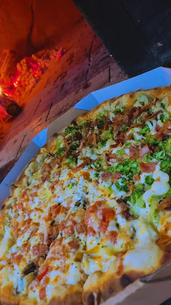 Foto 1 The house pizzaria