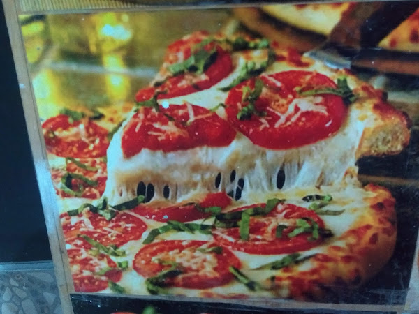 Foto 1 Pizzaria Planeta Gospel