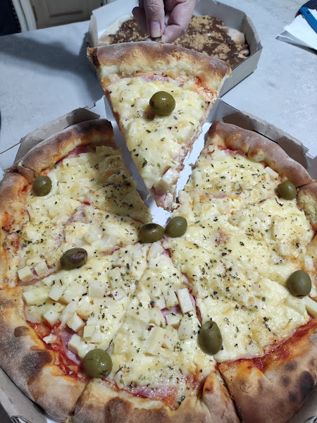 Foto 1 Peoples Pizza